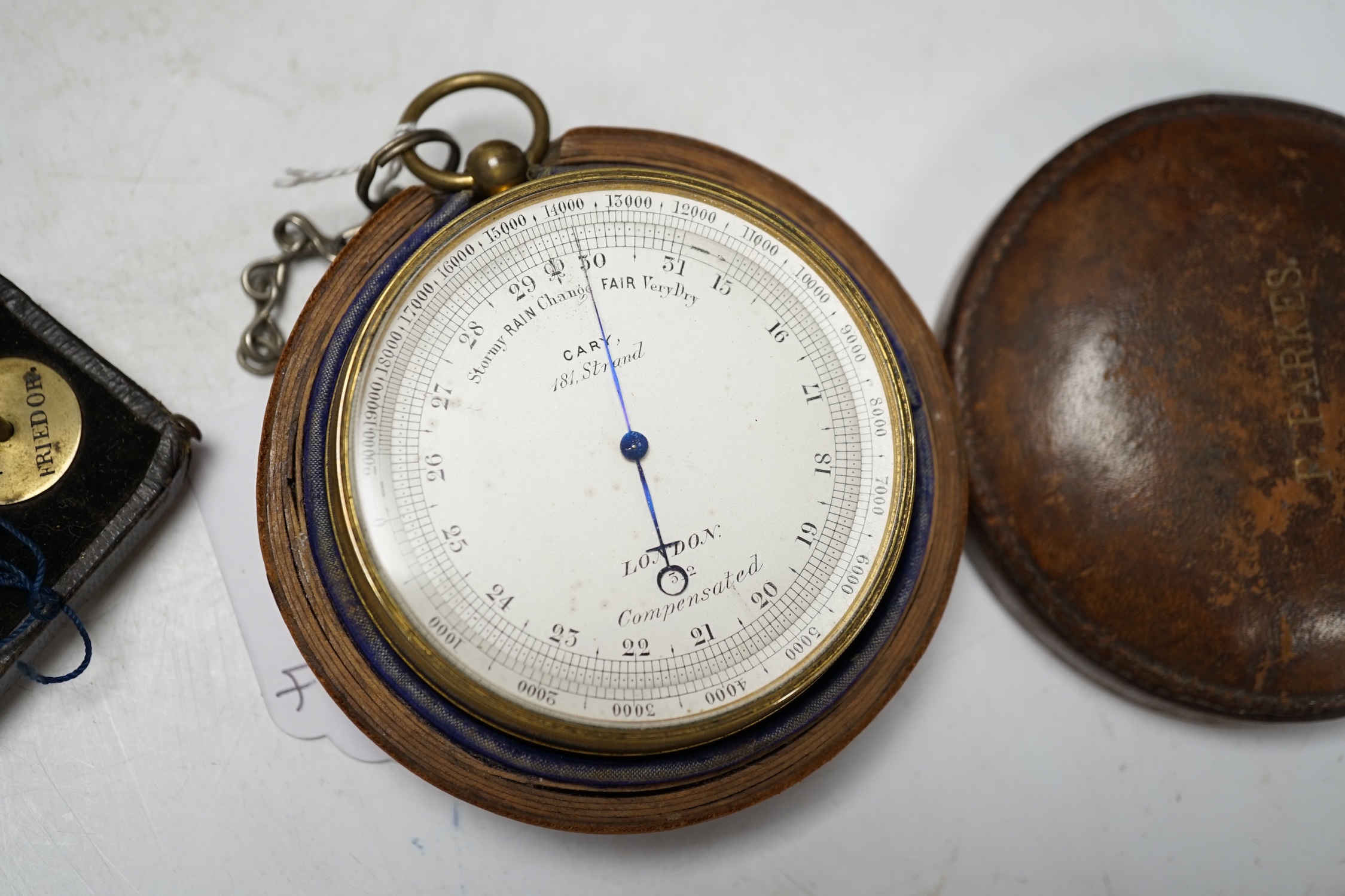 A cased travelling set of scales, a Cary of London small travelling barometer, a tea caddy and a small wall barometer. Condition - fair
